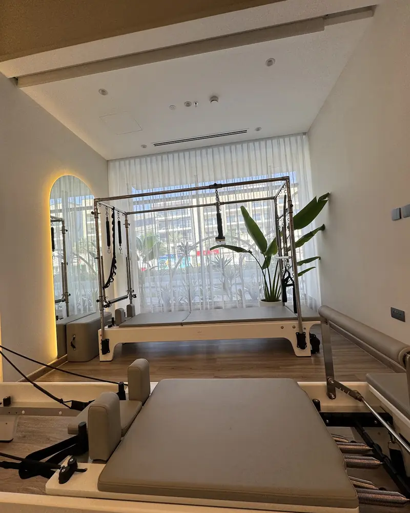 Inside Pilates Academy Arjan — the cadillac, by the window